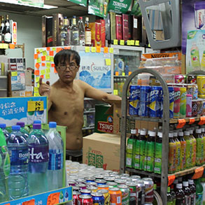 A merchant mans his store in the Hong Kong heat